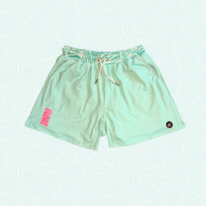 Light green shorts with a small pink logo on a light blue background