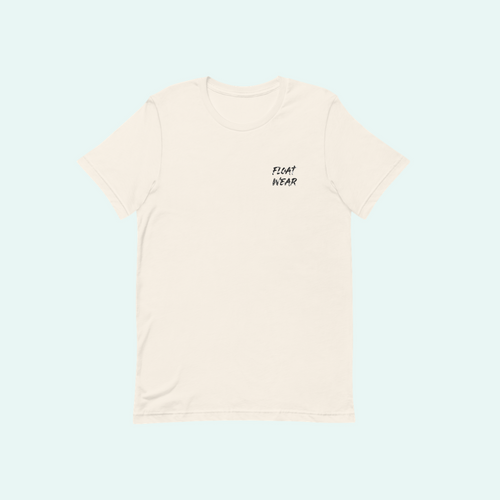 A cream-colored short-sleeve t-shirt with 'FLOAT WEAR' printed in black script on the left chest, displayed against a very pale blue background.